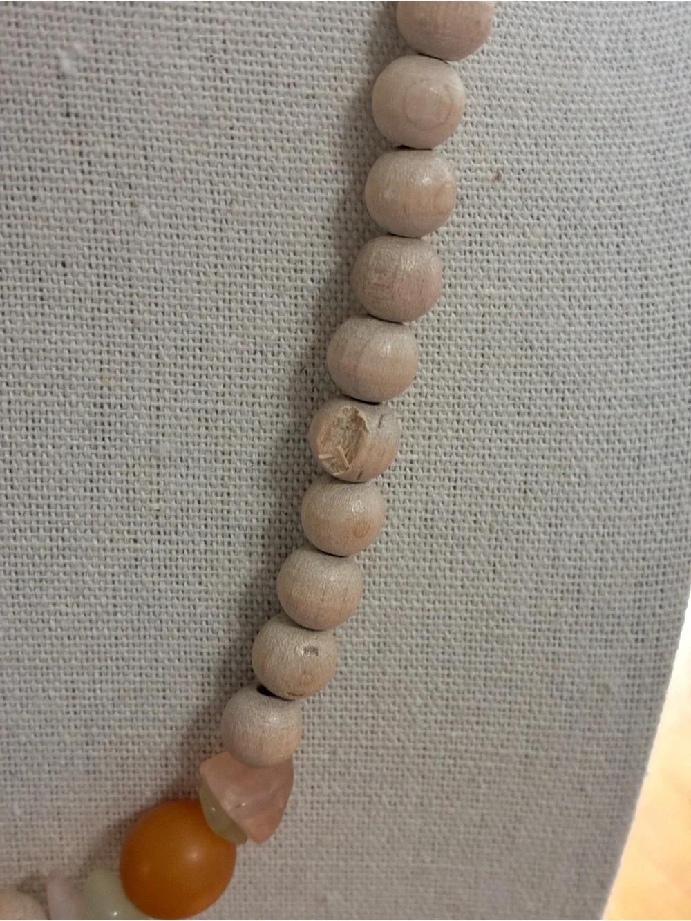 The item in the image is a vintage beaded statement necklace.